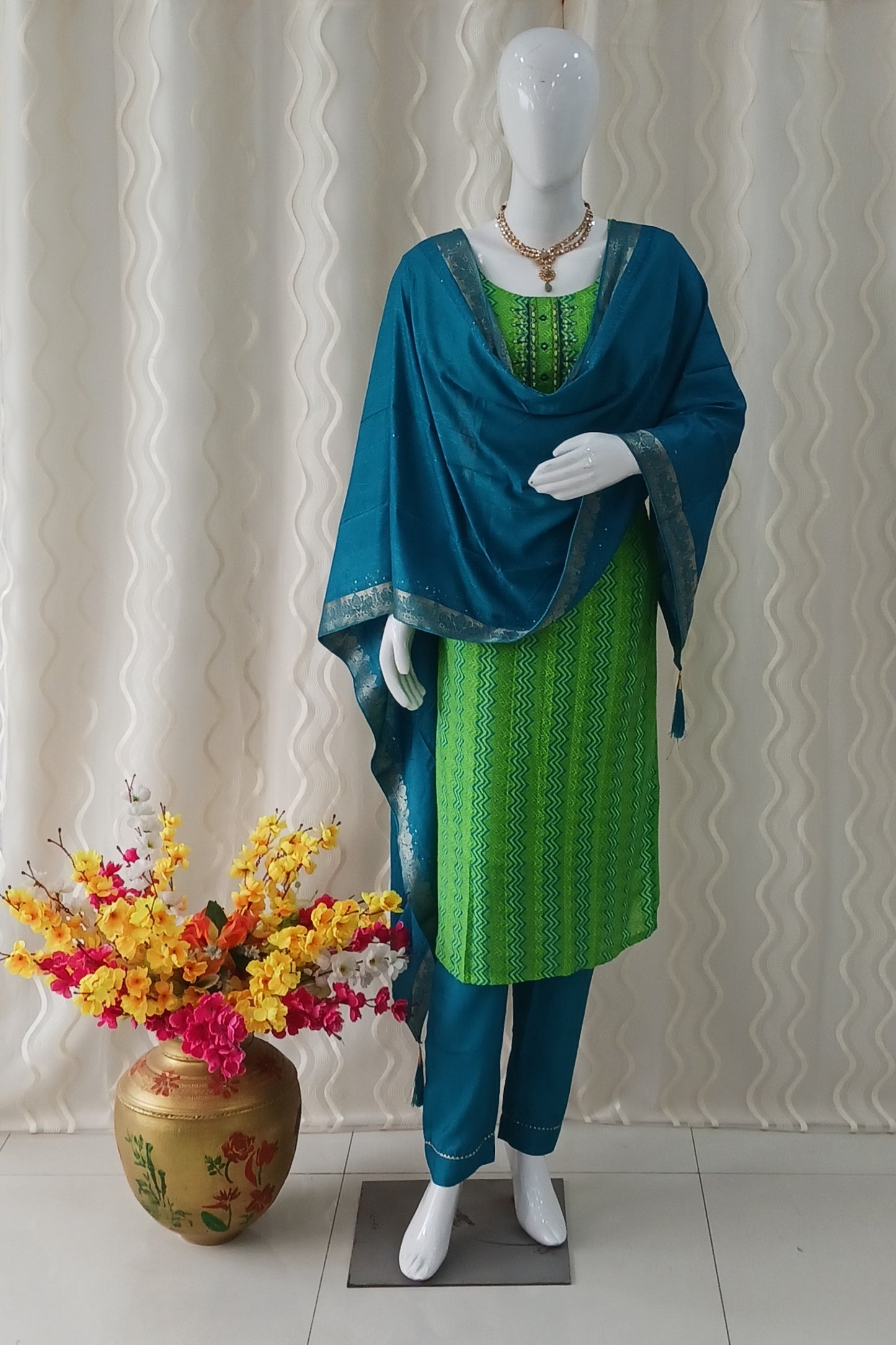 Parrot Green Straight Cut 3-Piece Suit with Duppatta and Sleeveless with Attached Sleeves