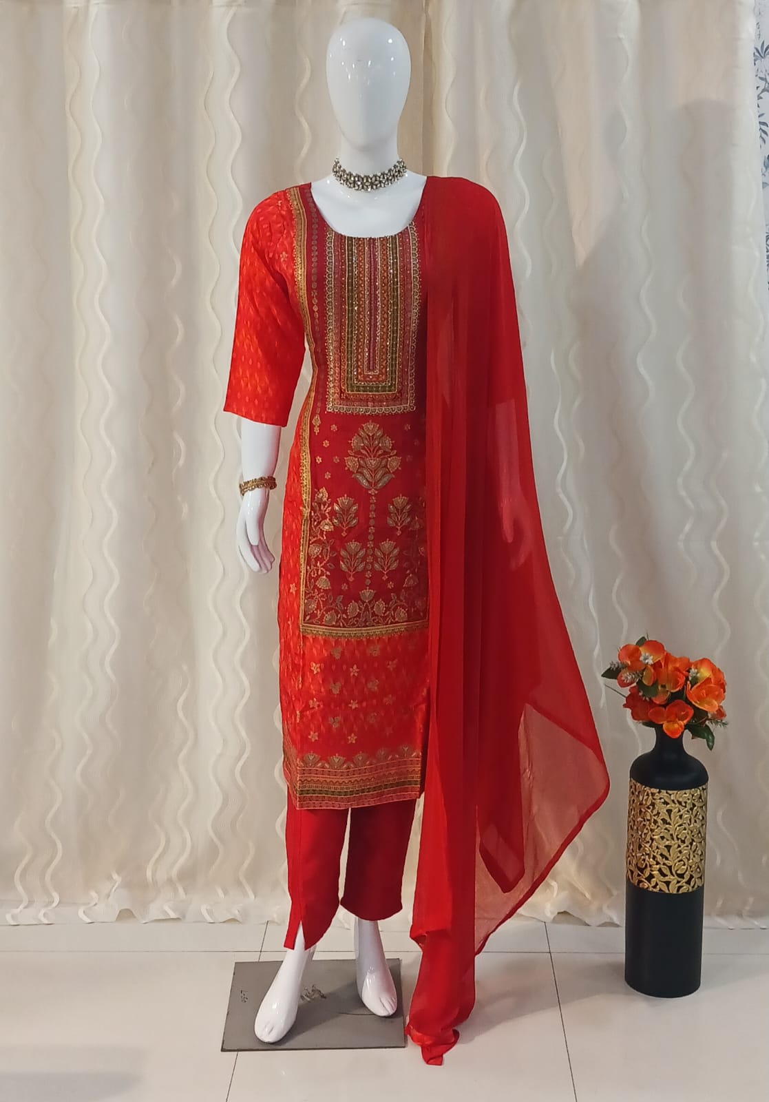 Red Straight Cut 3-piece suit with Contrast Work Dupatta with sleeves attached.