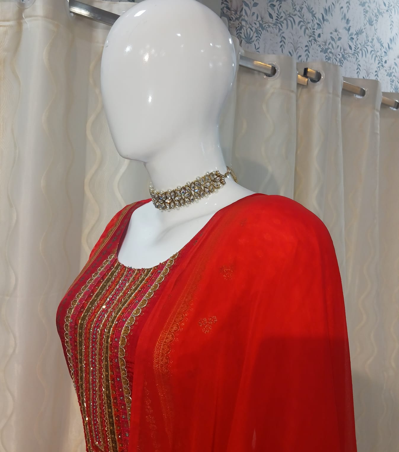 Red Straight Cut 3-piece suit with Contrast Work Dupatta with sleeves attached.