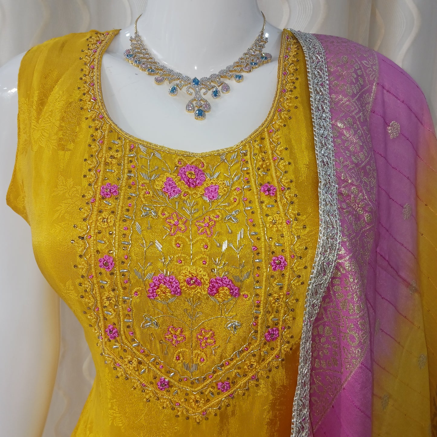 Straight Cut 3-Piece Suit with Netted Work Dupatta and Attached Sleeves