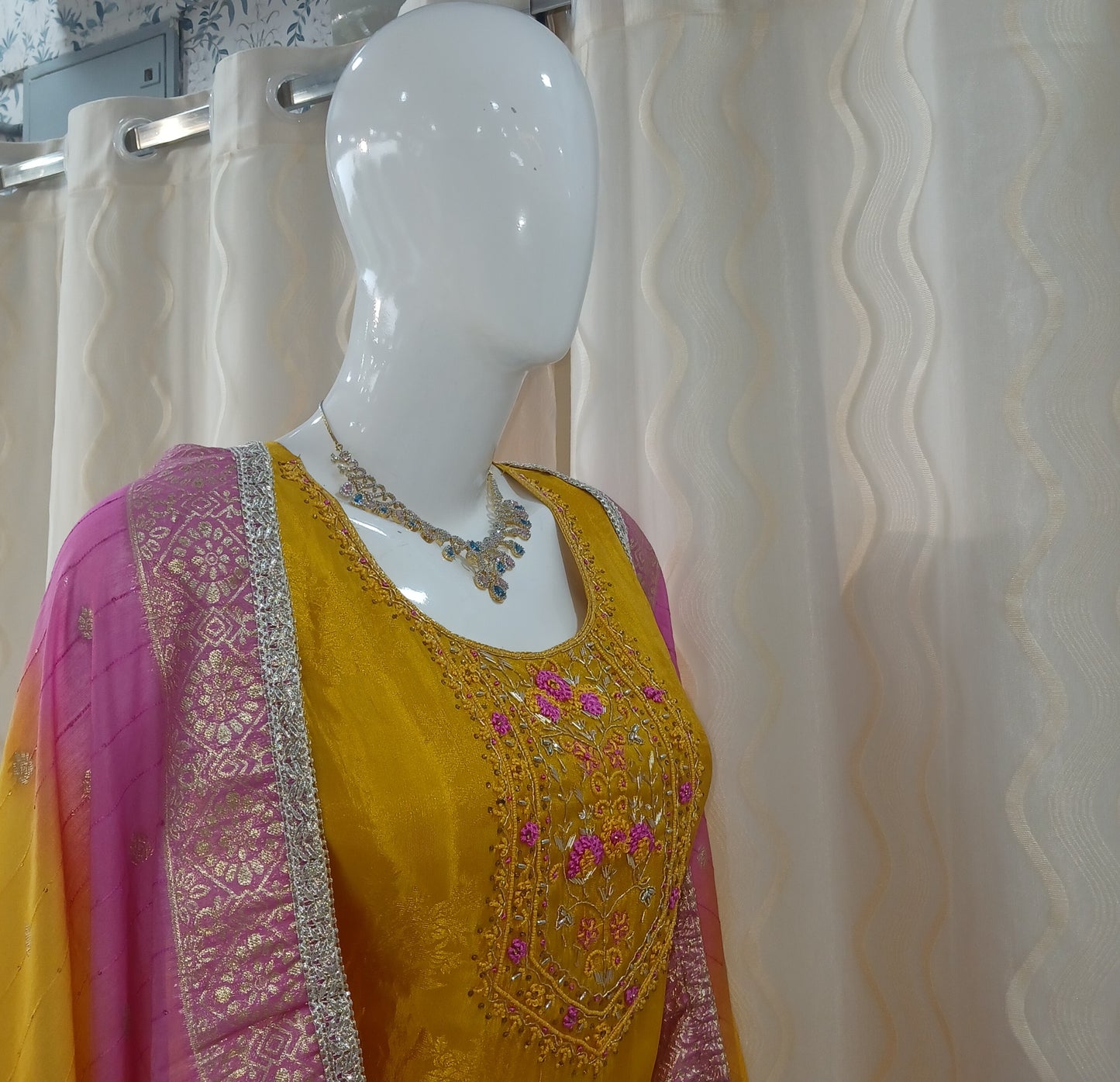 Straight Cut 3-Piece Suit with Netted Work Dupatta and Attached Sleeves
