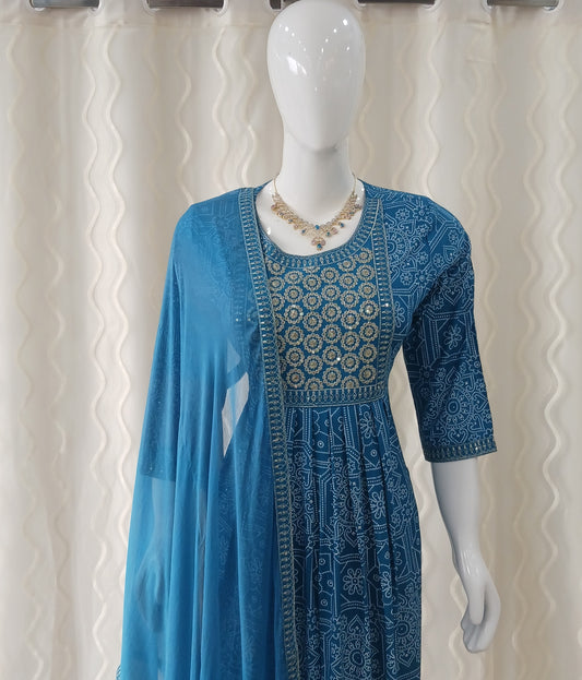 Blue Straight Cut 3 - Piece Suit with Duppatta and Sleeveless with Attached Sleeves.